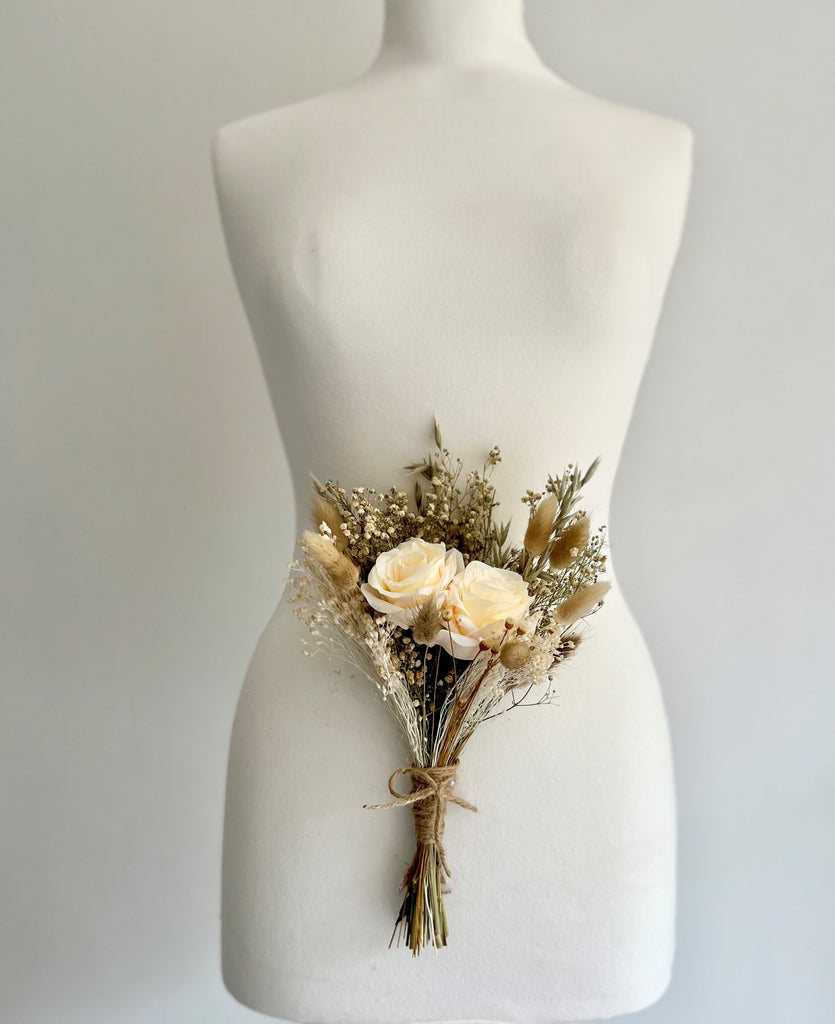 Lightweight, sustainable flower girl bouquet with faux silk roses and dried flowers
