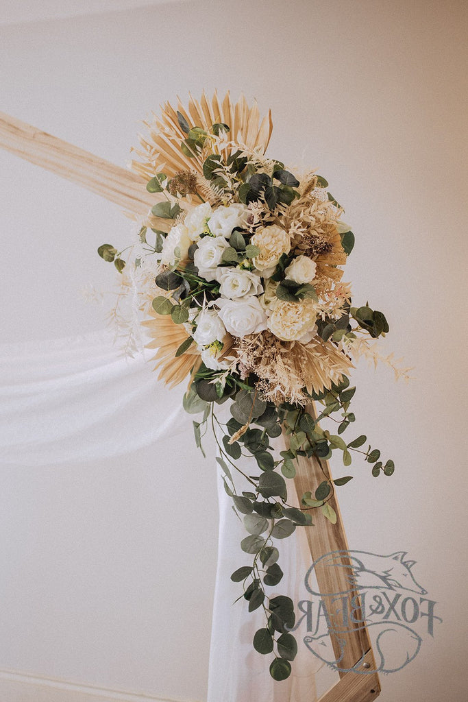 Floral arrangement on a wooden stand against a white background with 'FOX & HARE' branding.