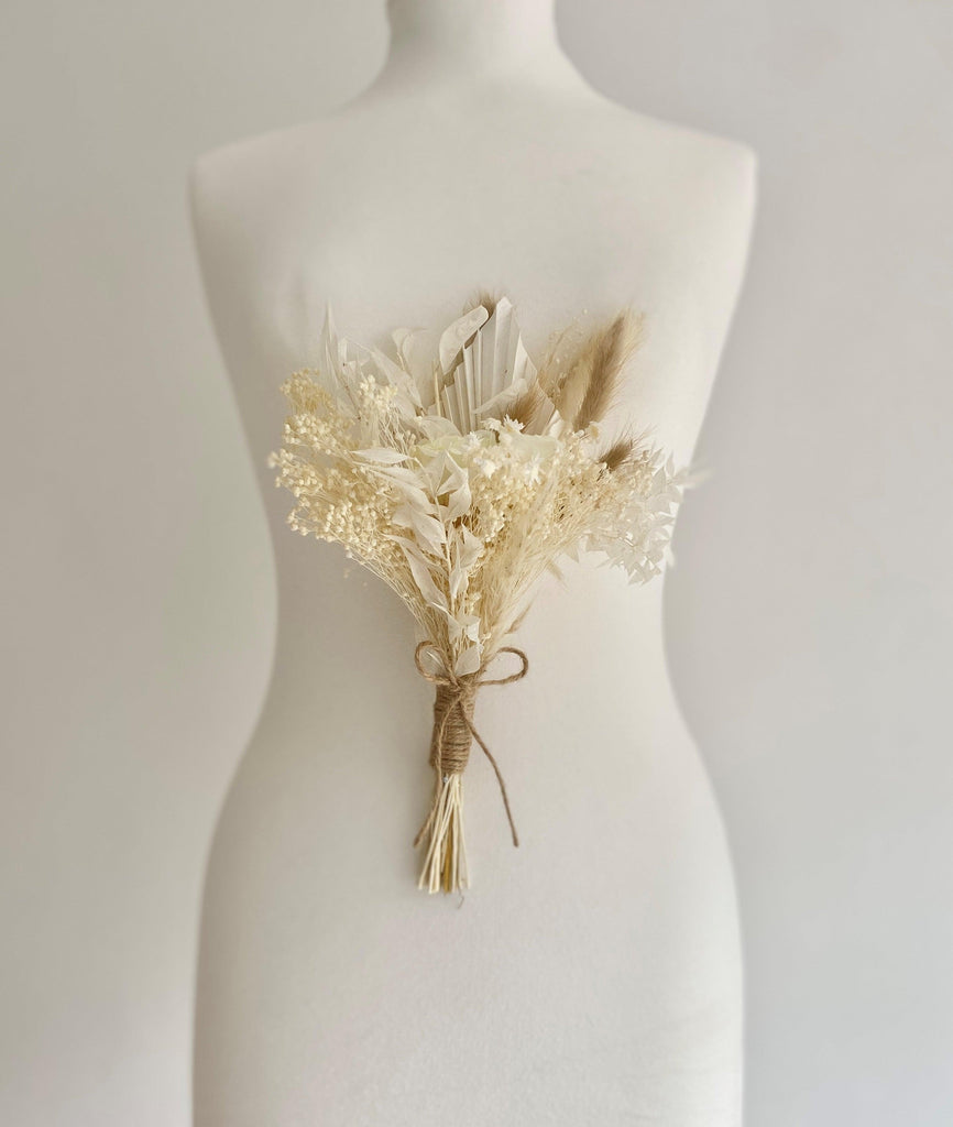 dried white flower girl bouquet